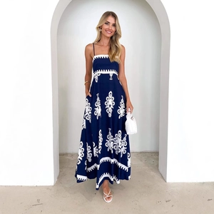 Elegant navy and white ethnic print maxi dress with slim fit backless strap design