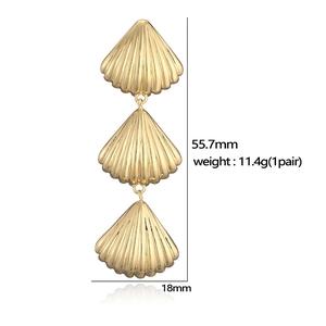 Three-layered golden seashell drop earrings featuring marine style and textured finish