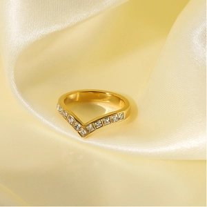 Polished gold V-shaped stainless steel ring for women with sparkling cubic zirconia stones