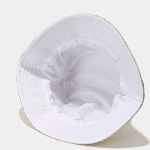 Detailed interior of fisherman hat showing precise white stitching and woven brim texture