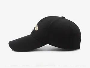 Side view of black baseball cap with golden BER letter embroidery on cotton twill