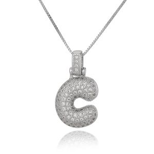 Detailed close-up of a silver letter C pendant featuring micro-paved sparkling zircon stones