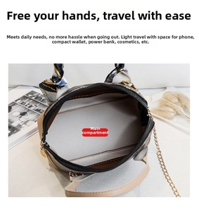 Top view of mini crossbody bag showing spacious interior with silk scarf wrapped handle