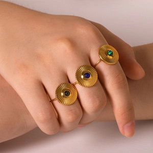 18K gold plated sunburst rings with colorful turquoise stones on female hand