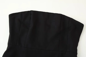 Detailed close-up of a black strapless tube top with premium stitching and slimming fit