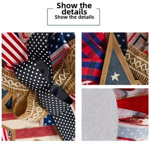 Detail of American Independence Day wreath featuring burlap ribbons and wooden star plaque