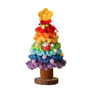 Handmade rainbow crochet Christmas tree on wood base with star topper and mini Santa