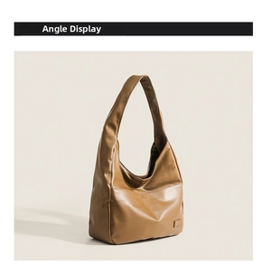 Side angle view of a brown vintage leather tote bag showing structure and side pocket