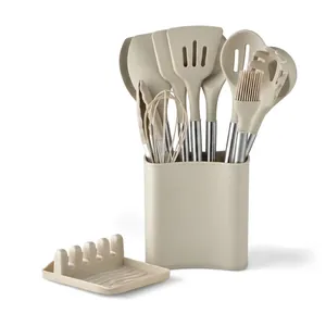 Detailed set of heat-resistant silicone kitchen utensils with stainless steel handles and holder