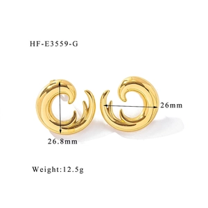 Detailed view of gold flame wave earrings with dimensions 26.8mm height and 26mm width