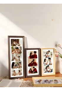Detailed view of multi-aperture solid wood photo frames on a cozy, rustic desktop