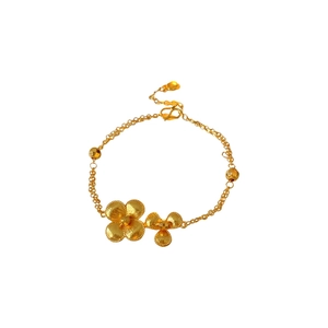 Vintage style 18k gold plated floral bracelet featuring textured double-chain design