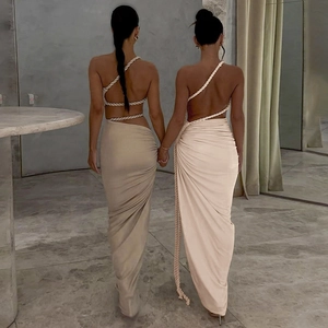 Elegant backless beige midi dress with unique white rope straps for 2025 summer fashion