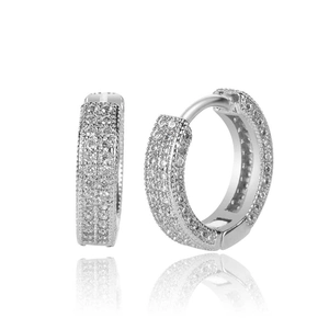 Macro shot of silver hip hop hoop earrings with micro-pave cubic zirconia stones