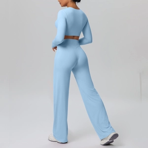 Women's sky blue sports set with long sleeve crop top and high waist wide leg pants