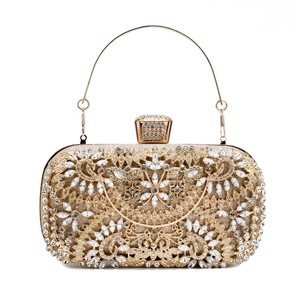Elegant gold hard-shell evening clutch bag with white rhinestones and metal handle