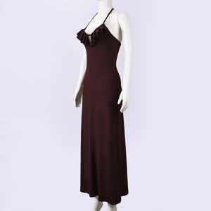 Detail of deep brown halter dress featuring delicate ruffles and knit texture details