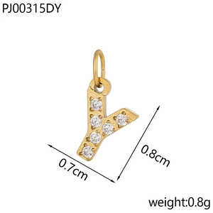 Close-up of golden letter Y pendant with inlaid zircons showing size dimensions