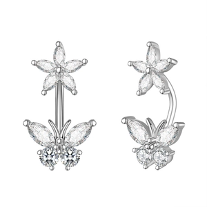 Detail view of silver belly ring featuring zircon butterfly and floral design motifs