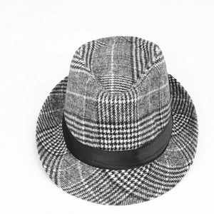 Top view of classic plaid jazz fedora hat with black satin band and textured finish