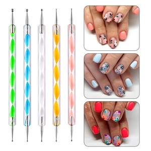 Detail showing five double-ended nail dotting tools with colorful spiral acrylic handles