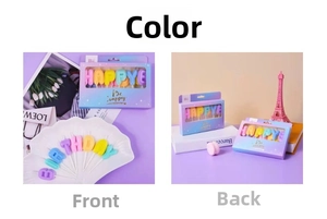 Detailed view of colorful HAPPY BIRTHDAY letter candle set in purple window gift box