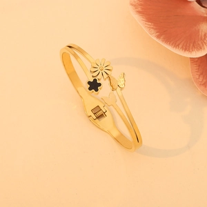 Bracelet jonc en acier inoxydable doré avec motifs de papillon et fleurs élégantes