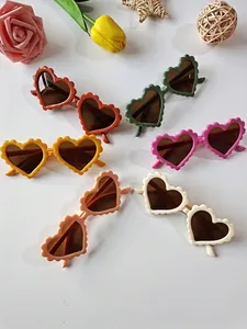 Set of 6 colorful heart-shaped sunglasses for kids with wavy carved frame details