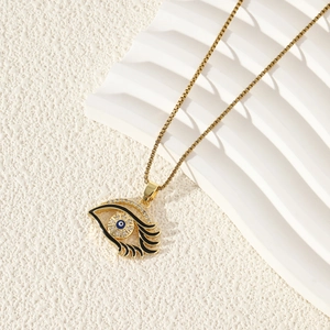 Golden heart evil eye pendant necklace with blue crystal and rhinestone eyelashes