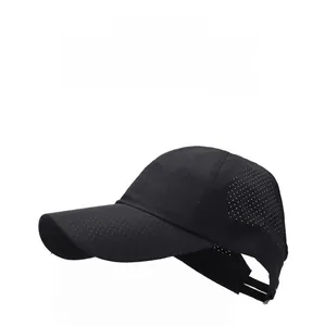 Detail of breathable mesh fabric on black quick-dry baseball cap for sun protection