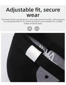 Detail of adjustable silver metal buckle on black twill cotton baseball cap back