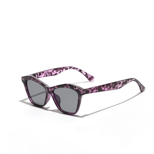 Vintage cat eye sunglasses in purple tortoiseshell frame with grey lenses for fashion
