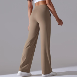 Back view of high-waisted wide-leg yoga pants in khaki with elastic breathable fabric
