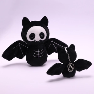 Detail of Halloween black bat plush keychain with skull embroidery and silver metal clasp