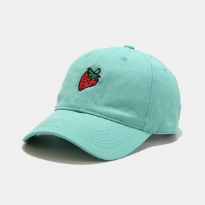 Close-up of strawberry embroidery on mint green cotton canvas baseball cap for summer