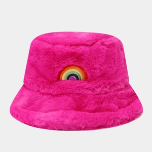 Pink faux fur bucket hat with colorful rainbow embroidery for winter warmth