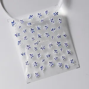 5D embossed nail art stickers featuring blue and white ink marble flower patterns