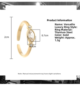 Detail view of gold titanium ring with marquise-cut zircon and adjustable band