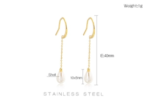 Detailed view of gold tassel earrings with shell drop pendants showing precise measurements