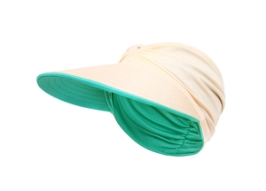 Detail of light beige and mint green sun visor with textured fabric and wide brim