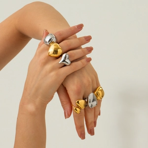 Exaggerated 18K gold and silver chunky heart rings in polished stainless steel for women