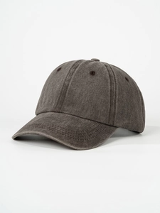 Detailed view of the vintage washed cotton baseball cap texture and ventilation eyelets