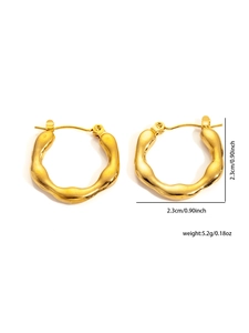 Detailed view of textured gold-plated irregular wavy earrings with size measurement of 2.3cm