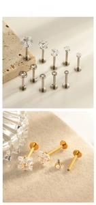 Macro detail of G23 titanium labret studs with square and round cubic zirconia inlay
