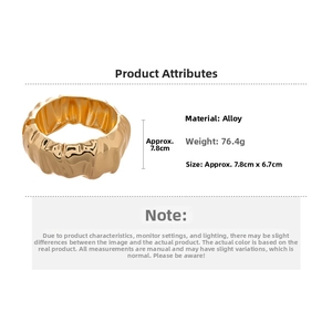 Detail view of gold textured alloy cuff bracelet showing 76.4g weight and 7.8cm size