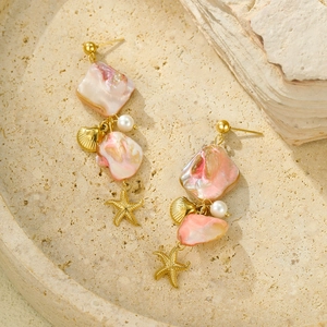 Bohemian gold starfish earrings with pink shell and pearl on stone plate