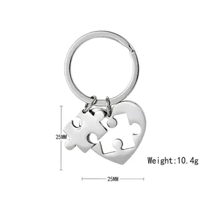 Polished heart puzzle piece keychains set in silver stainless steel for couples