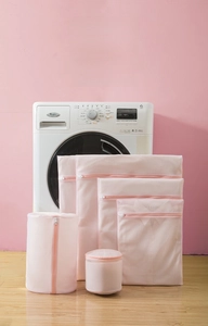Pink fine mesh laundry bags set showing 6 pieces in various sizes for washing machines