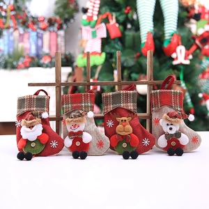 Set of 4 Christmas stockings with 3D Santa, Snowman, Reindeer, and Bear dolls on burlap
