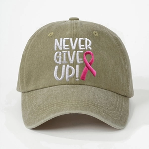 Detail of Never Give Up embroidery on olive green washed cotton baseball cap